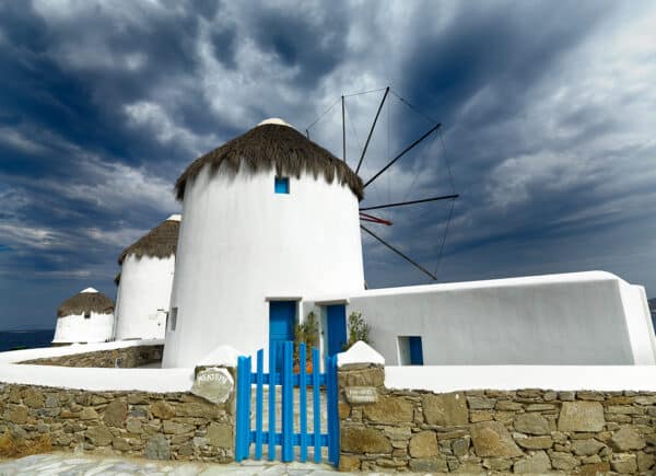 Nature photography windmill Mykonos Greece landscape photography blue sky white fence